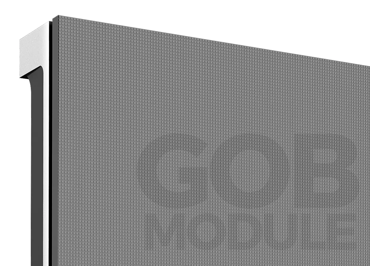 Close-up of a large, textured digital display panel with a white vertical edge on the left.