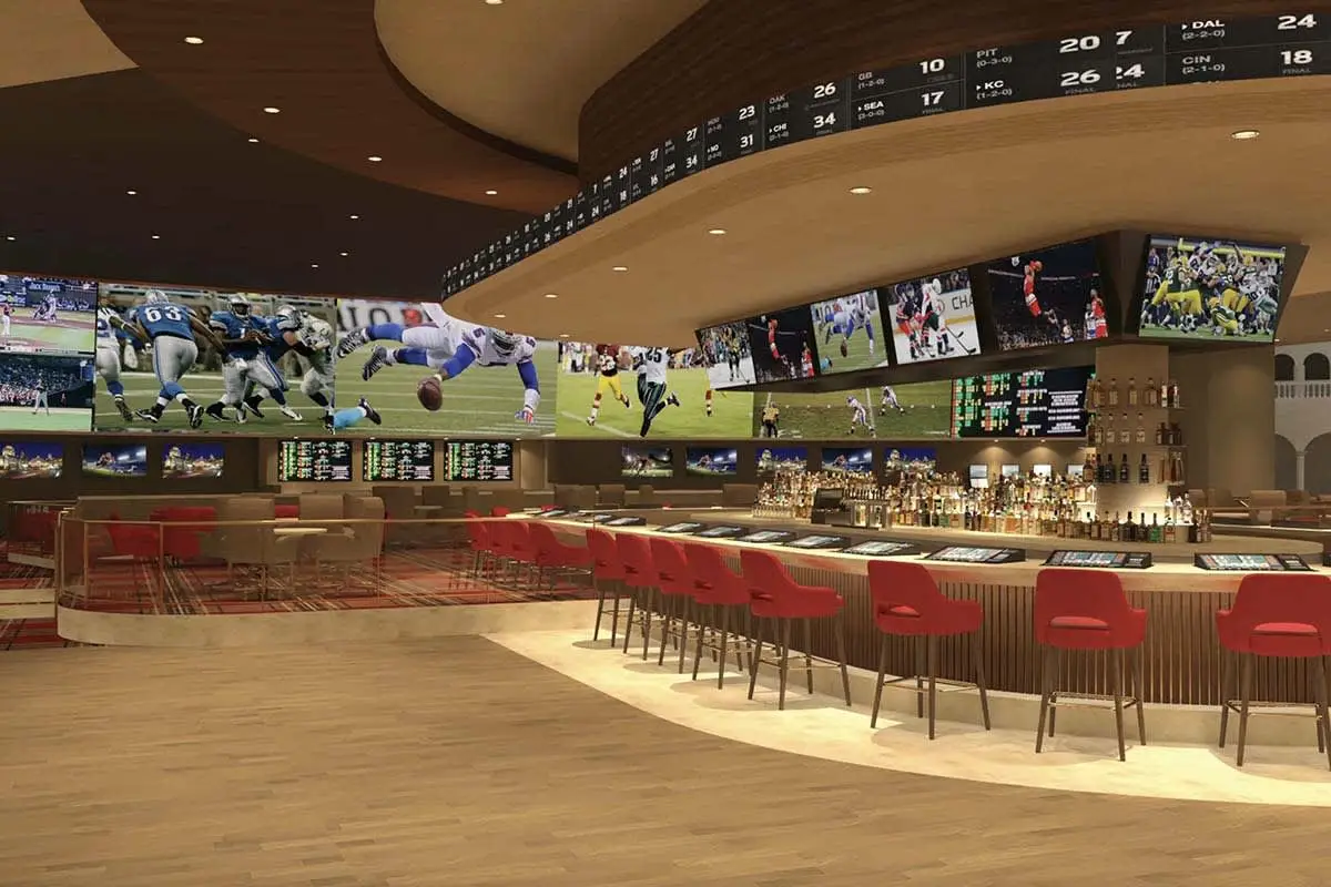 LED Display in the Bars - EagerLED | Leading LED Screen Supplier - EagerLED | Leading LED Screen Supplier Curved bar with red stools, liquor bottles behind, and multiple large sports screens around the room showing football and other games. A wooden floor and warm lighting create a lounge vibe.