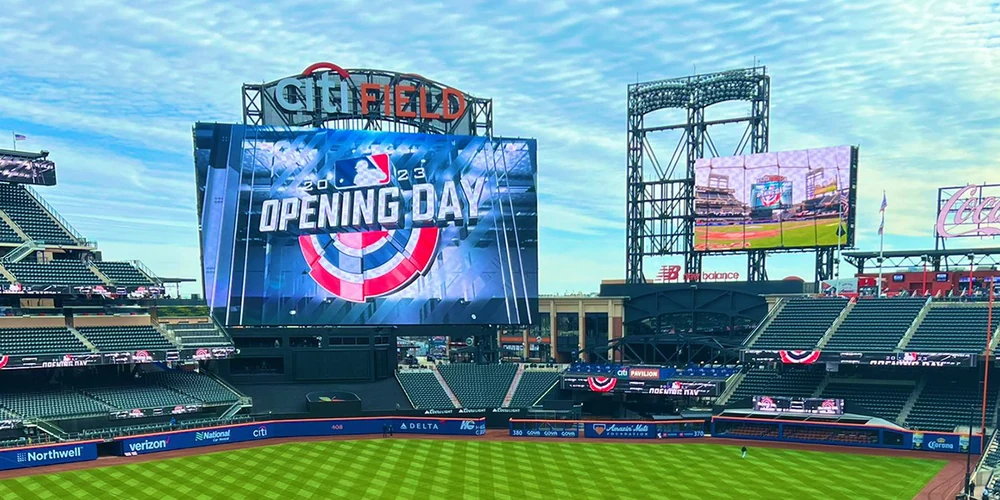 Baseball stadium with large outfield LED jumbotron screens