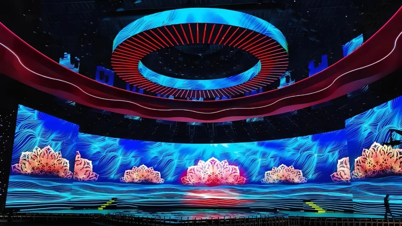 Large curved LED video wall installation serving a live stage production